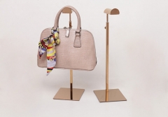 Showcase Your Style with a Stunning Rose Gold Handbag Display